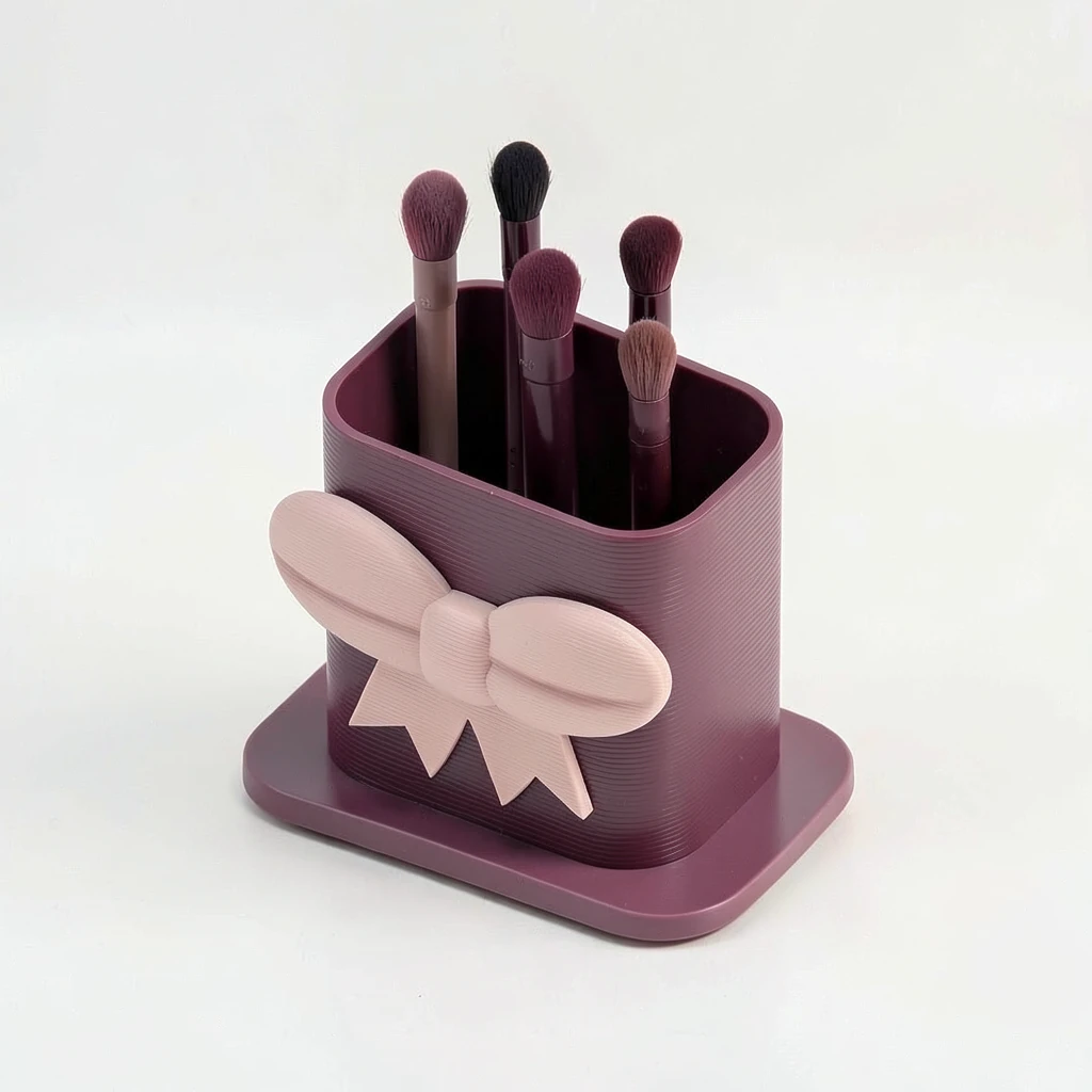 Sculpted Bow Brush Cup — In use. Styling contents are not included. Confirm actual package dimensions before ordering.